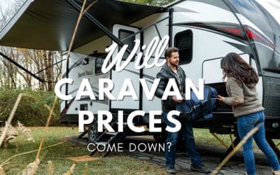 man and woman camp using caravan