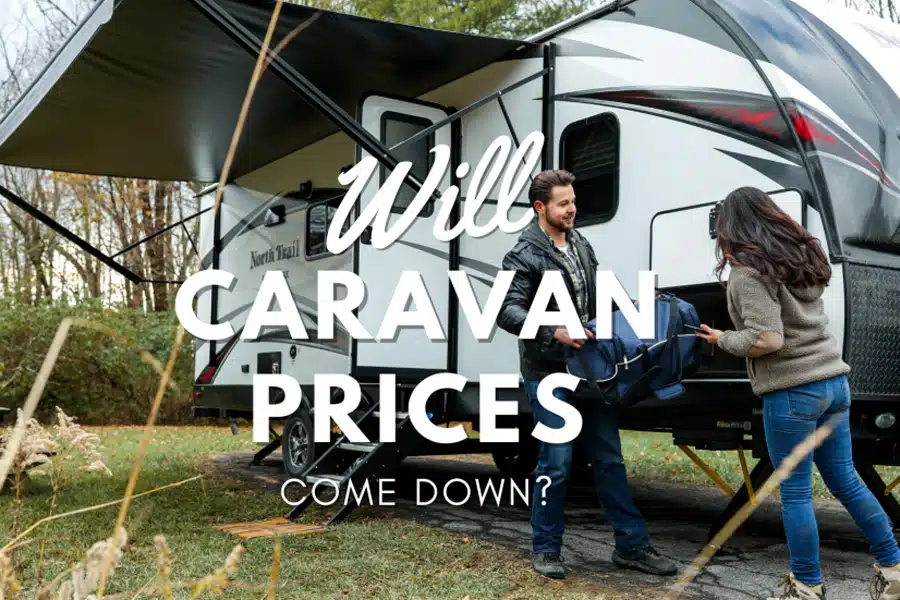 man and woman camp using caravan