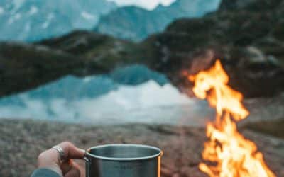 woman holding cup on a camping
