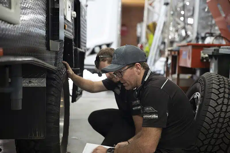 todd checking the van